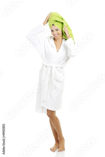 Photo: Attractive woman with a towel on her head Attractive woman with a towel on her head