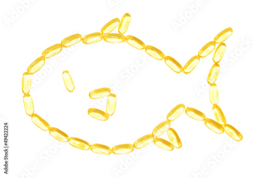 Photo: Omega-3 fish oil supplement pills isolated on white background Omega-3 fish oil supplement pills isolated on white background