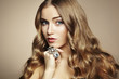 Portrait of young beautiful woman with jewelry