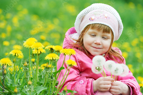Photo: baby with spring dandelion baby with spring dandelion