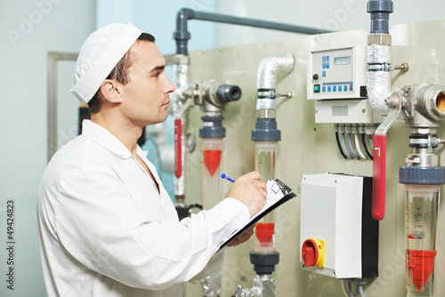 Photo: pharmaceutical factory worker pharmaceutical factory worker