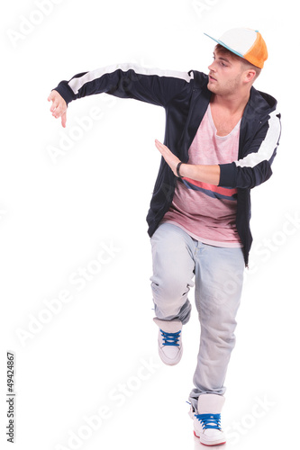 Photo: male dancer posing on one leg male dancer posing on one leg