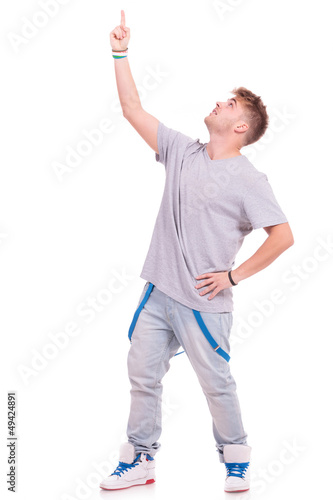 Photo: man pointing & looking upwards man pointing & looking upwards