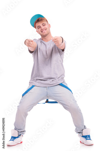 Photo: dancer pointing with both hands dancer pointing with both hands