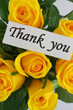 Thank you note and yellow roses