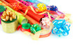 Rolls of Christmas wrapping paper with ribbons, bows isolated