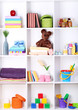 Beautiful white shelves with different baby related objects