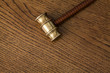 auction hammer on wooden desk