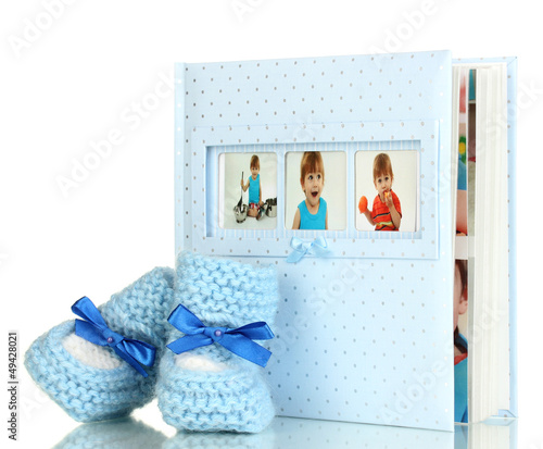 Photo: Baby photo album isolated on white Baby photo album isolated on white