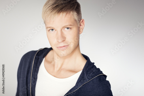 Photo: Portrait of charming confident man. Portrait of charming confident man.