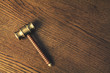 auction hammer on wood