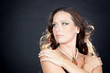 Beautiful brunette woman with jewelry