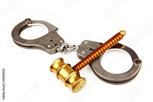 Photo: gavel and handcuffs gavel and handcuffs