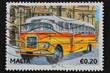 Malta: circa 2011; stamp with classic yellow Maltese bus