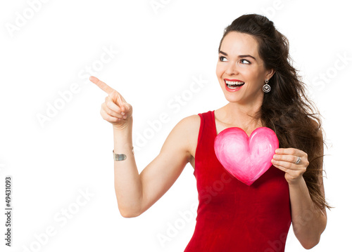 Photo: Happy woman holding a love heart Happy woman holding a love heart
