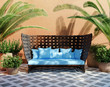 Romantic aged stucco patio with outdoor sofa and plants