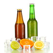 Beer bottles in ice isolated on white