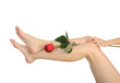 Female legs with rose isolated on white background