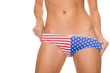 Young woman with usa lingerie in front of white background