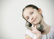 Photo: Little girl with vintage phone Little girl with vintage phone
