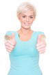 Young and smiling woman in front of white background