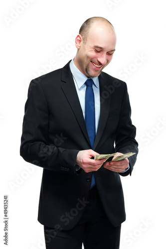 Photo: Man considers money Man considers money