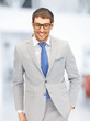 happy businessman in spectacles