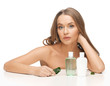 woman with cosmetic bottles