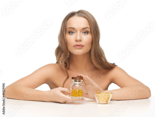 Photo: woman with vitamins woman with vitamins