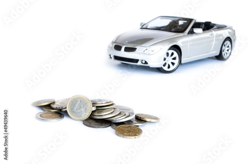 Photo: money & car isolated on the white background money & car isolated on the white background