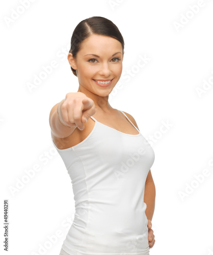 Photo: woman in blank white t-shirt pointing her finger woman in blank white t-shirt pointing her finger