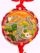 Great wall of China bas relief pendant isolated on white backgro