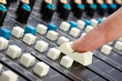 Finger on Mixing Desk