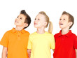 Portrait of the happy children looking up
