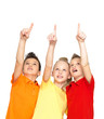 Portrait of the happy children point up  by finger - isolated on
