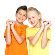 happy children with a sign of heart shape