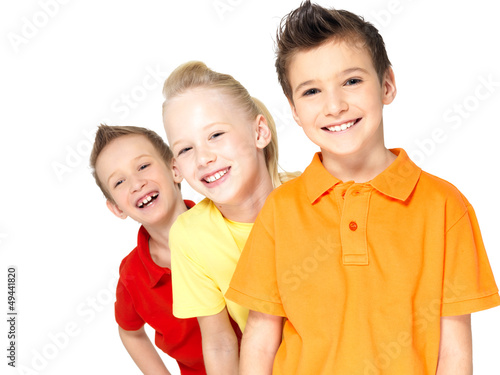 Photo: Portrait of the happy children isolated on white Portrait of the happy children isolated on white