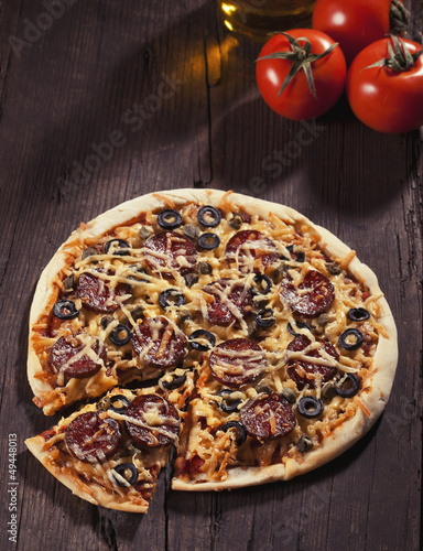 Photo: Tasty pepperoni pizza Tasty pepperoni pizza