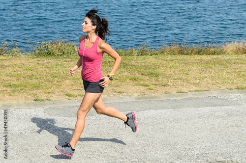 Photo: Fitness woman running Fitness woman running