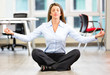 Business woman doing yoga