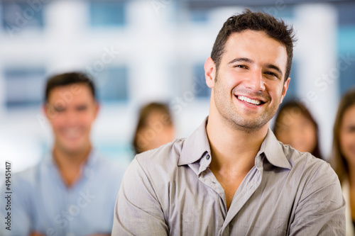 Photo: Business man with a group Business man with a group