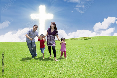 Photo: Catholic family at the Cross Catholic family at the Cross