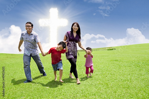 Photo: Asian family stroll in Easter Asian family stroll in Easter