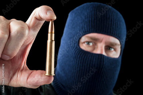 Photo: Bullet and terrorist Bullet and terrorist