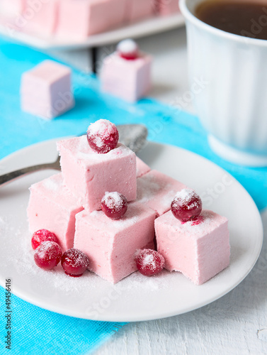 Photo: Homemade cranberries marshmallow on blue napkin. Selective focus Homemade cranberries marshmallow on blue napkin. Selective focus