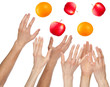 Many hands want to catchs fruits, isolated on white