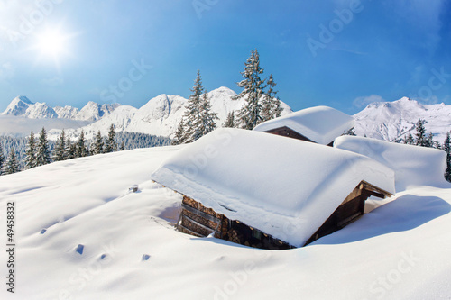 Photo: Snow covered hut winter landscape Snow covered hut winter landscape