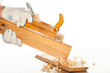 Photo: Closeup image of manual worker and classic grinder Closeup image of manual worker and classic grinder