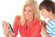 Foto: Sister showing brother tablet Sister showing brother tablet