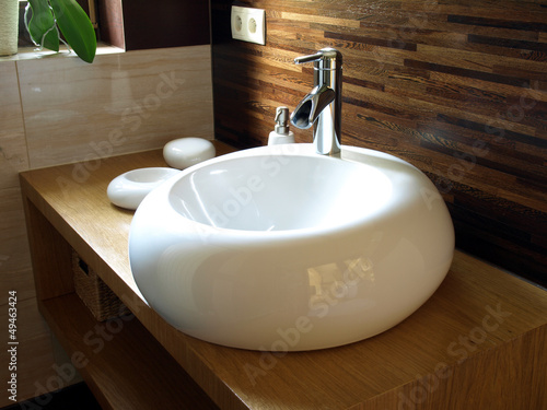 Photo: Round sink in a modern bathroom Round sink in a modern bathroom
